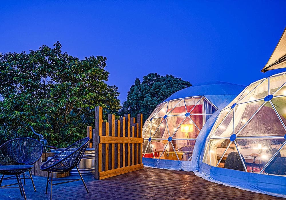 A healing glamping space in the forest with 3 types of tents